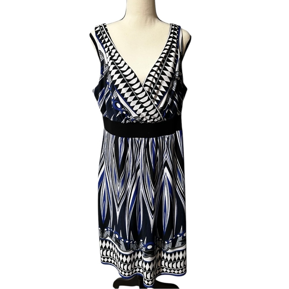Tiana B, Black, Blue and, White sleeveless dress with an empire waist.